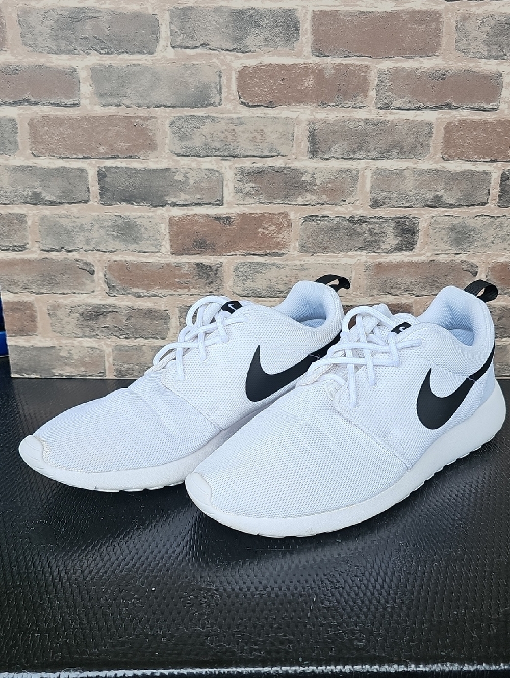 Nike White Athletic Sneakers with Black Swoosh